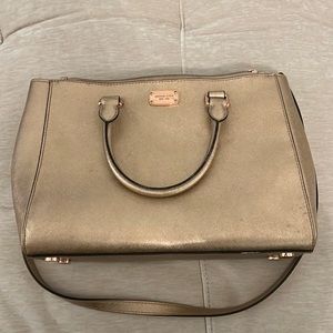 MK rose gold purse